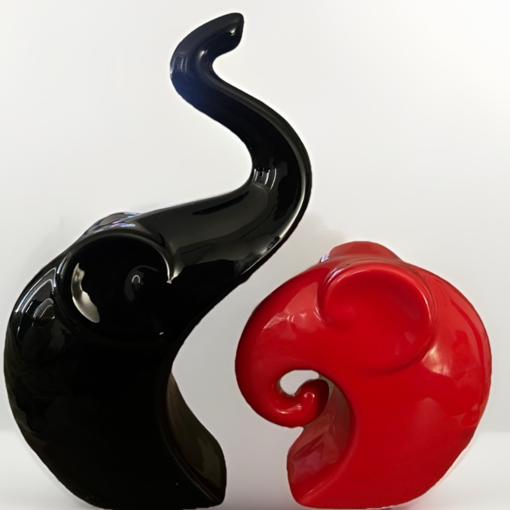 Elegant Black and Red Elephant Sculptures